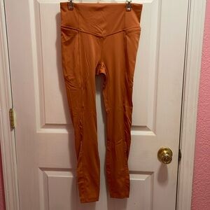Rusty Orange CALIA Leggings w/ mesh detail on the back of calf